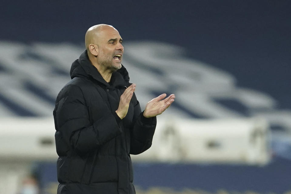 El técnico del Manchester City Pep Guardiola durante el partido contra Borussia Dortmund por la Liga de Campeones, el martes 6 de abril de 2021, en Manchester. (AP Foto/Dave Thompson)