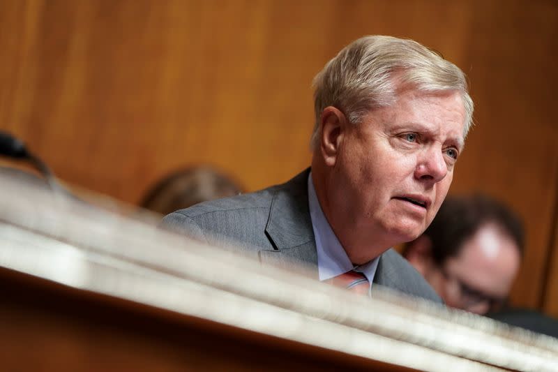 Senate Judiciary Chairman Lindsey Graham (R-SC) questions judicial nominees during a hearing on Capitol Hill in Washington