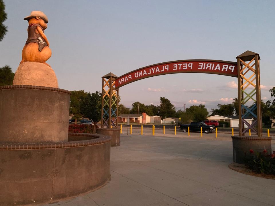 Prairie Pete Playland Park in Odessa, Texas, catches the last rays of the sun Monday. Earlier, dozens of local high school teens had gathered in the park to both grieve a fellow student killed in the recent mass shooting here, but also to take action and raise funds for survivors.