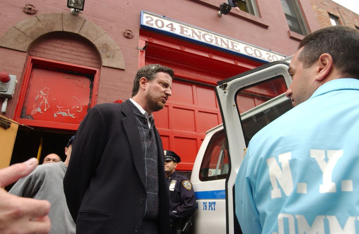 City Council member Bill de Blasio (c.) is taken into custody while protesting the closing of Engine Company 204 on May 25, 2003 in the Brooklyn, New York. City officials have justified the closings by saying population shifts have made the firehouses unnecessary. de Blasio was a City Council member from 2002 to 2009 before succesfully running for Public Advocate.