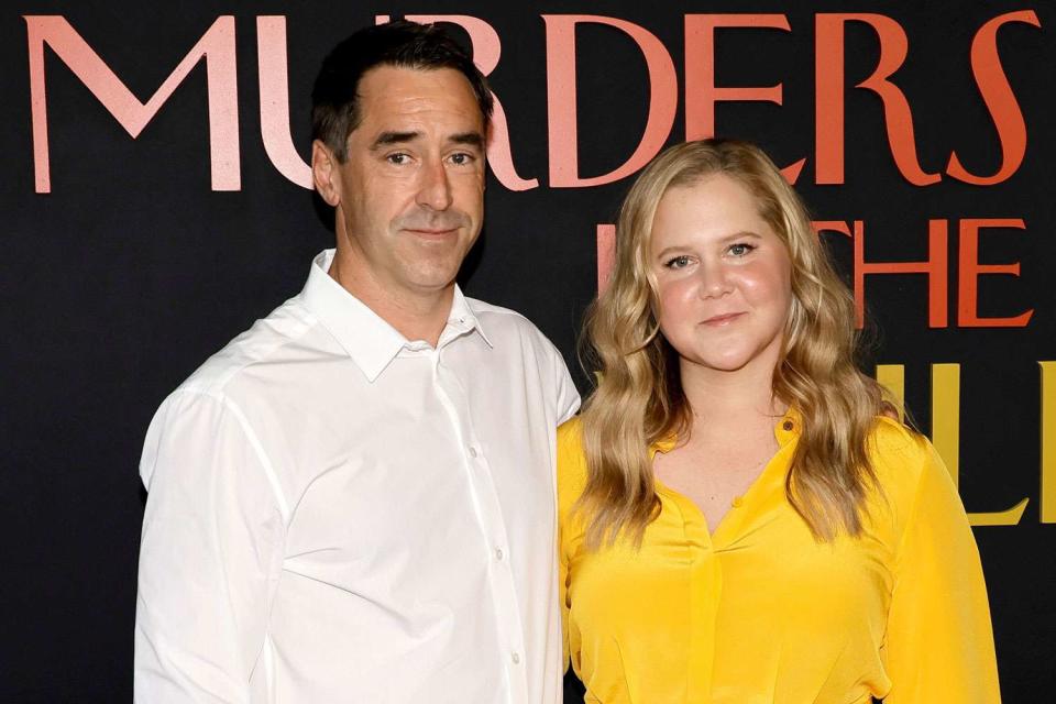 <p>Kevin Winter/Getty</p> Chris Fischer and Amy Schumer attend the Los Angeles premiere of "Only Murders In The Building" Season 2 at DGA Theater Complex on June 27, 2022 in Los Angeles, California.