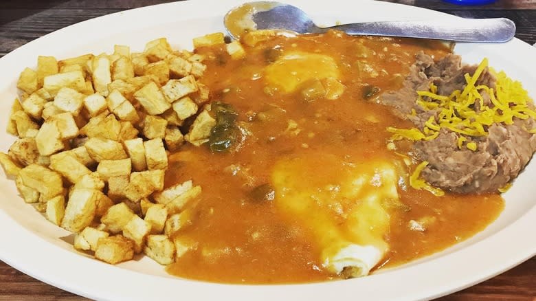 huevos rancheros with potatoes and beans