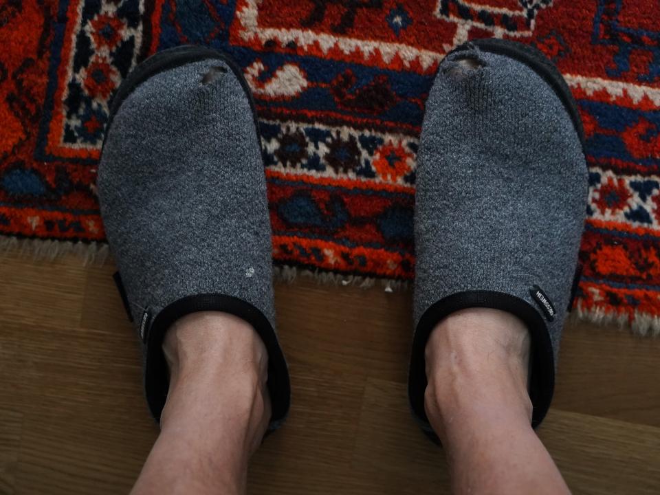 feet in a pair of slippers