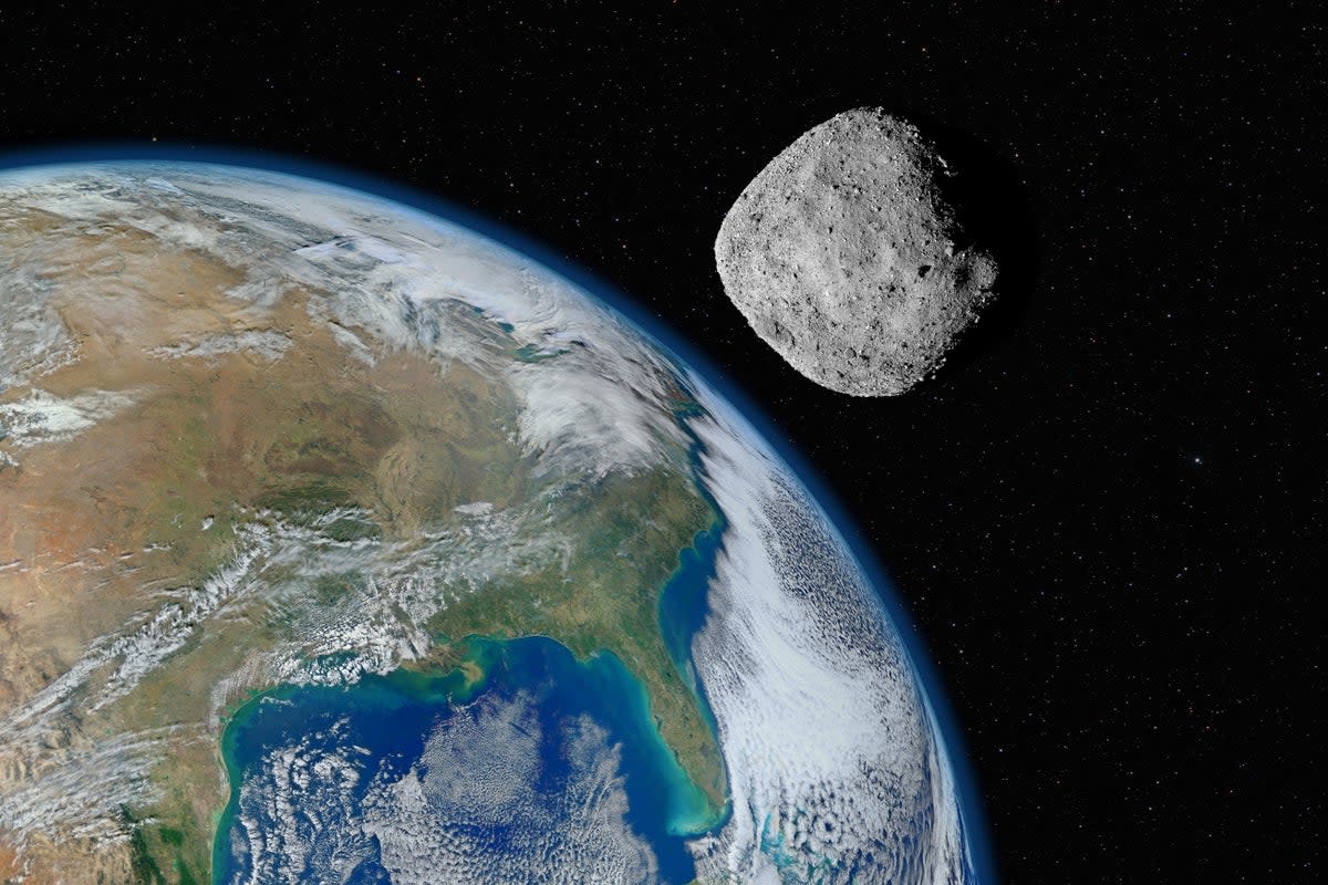 An artist’s conception of an asteroid passing close to Earth (Getty Images/iStockphoto)