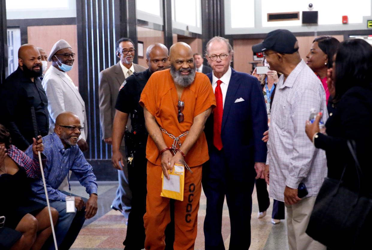 Glynn Ray Simmons is brought to court April 18 for an evidentiary hearing in Oklahoma County District Court. Behind him is defense attorney John Coyle.