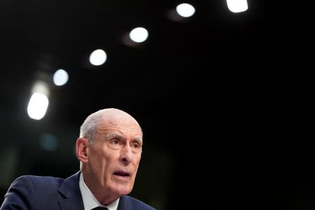 Director of National Intelligence Dan Coats testifies to the Senate Intelligence Committee hearing about "worldwide threats" on Capitol Hill in Washington