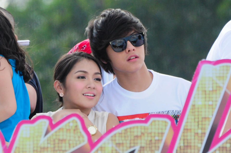 Kathryn Bernardo and Daniel Padilla are seen together at the float of the MMFF 2012 entry, "Sisterekas" during the 2012 Metro Manila Film Festival Parade of Stars on 23 December 2012. (Angela Galia/NPPA Images)