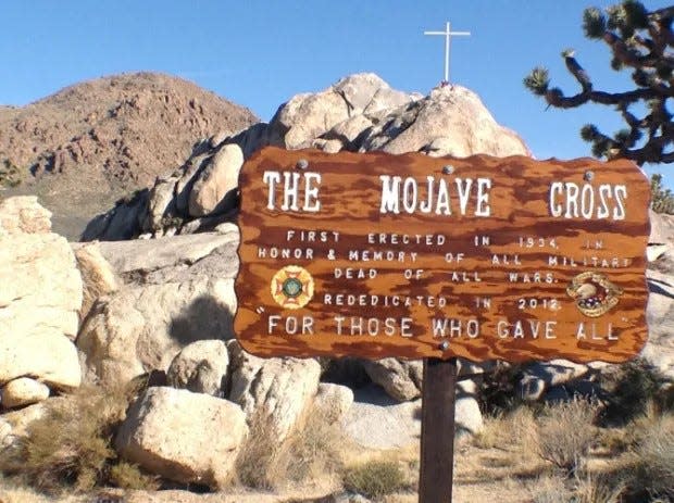 In 1934, Army veteran John Riley Bembry joined other local homesteaders to erect the original Mojave Memorial Cross atop Sunrise Rock, near Teutonia Peak just south of Mountain Pass in the Mojave National Preserve. The once controversial cross stood just south of Mountain Pass in the Mojave National Preserve. The memorial to fallen war veterans also faced a legal battle for its removal, was stolen and finally located.