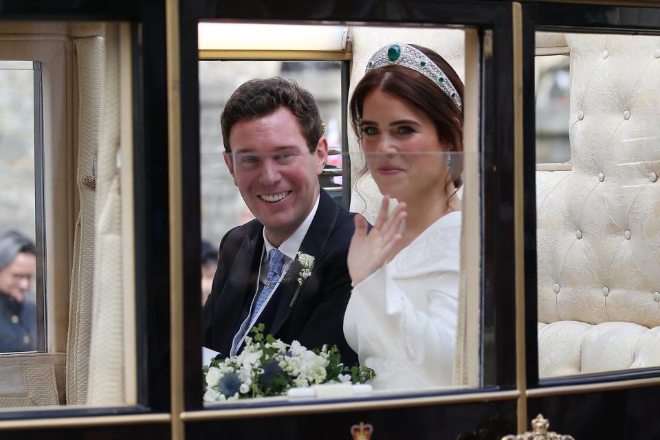 Princess Eugenie of York and Jack Brooksbank leave by carriage after their Wedding at at St. George's Chapel, Windsor Castle on October 12, 2018 in Windsor, England.