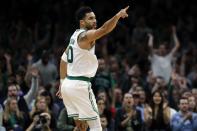 Boston Celtics' Jayson Tatum reacts after making a 3-point basket during the first half of an NBA basketball game against the Chicago Bulls, Friday, Nov 4, 2022, in Boston. (AP Photo/Michael Dwyer)