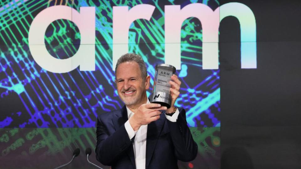 Arm Holdings CEO Rene Haas poses with the Opening Bell Crystal at the Nasdaq MarketSite on September 14, 2023 in New York City.