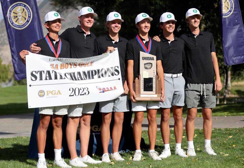 Olympus players pose for a photo after winning the 5A boys state golf championship at Fox Hollow Golf Club in American Fork on Tuesday, Oct. 10, 2023. | Kristin Murphy, Deseret News