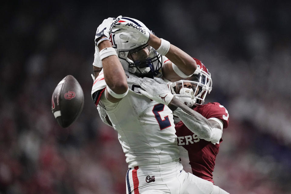 Arizona cornerback Treydan Stukes (2) breaks up a pass intended for Oklahoma wide receiver Jalil Farooq (3) during the second half of the Alamo Bowl NCAA college football game in San Antonio, Thursday, Dec. 28, 2023. (AP Photo/Eric Gay)