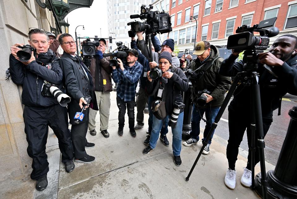 WORCESTER -Members of the media wait outside the federal courthouse.