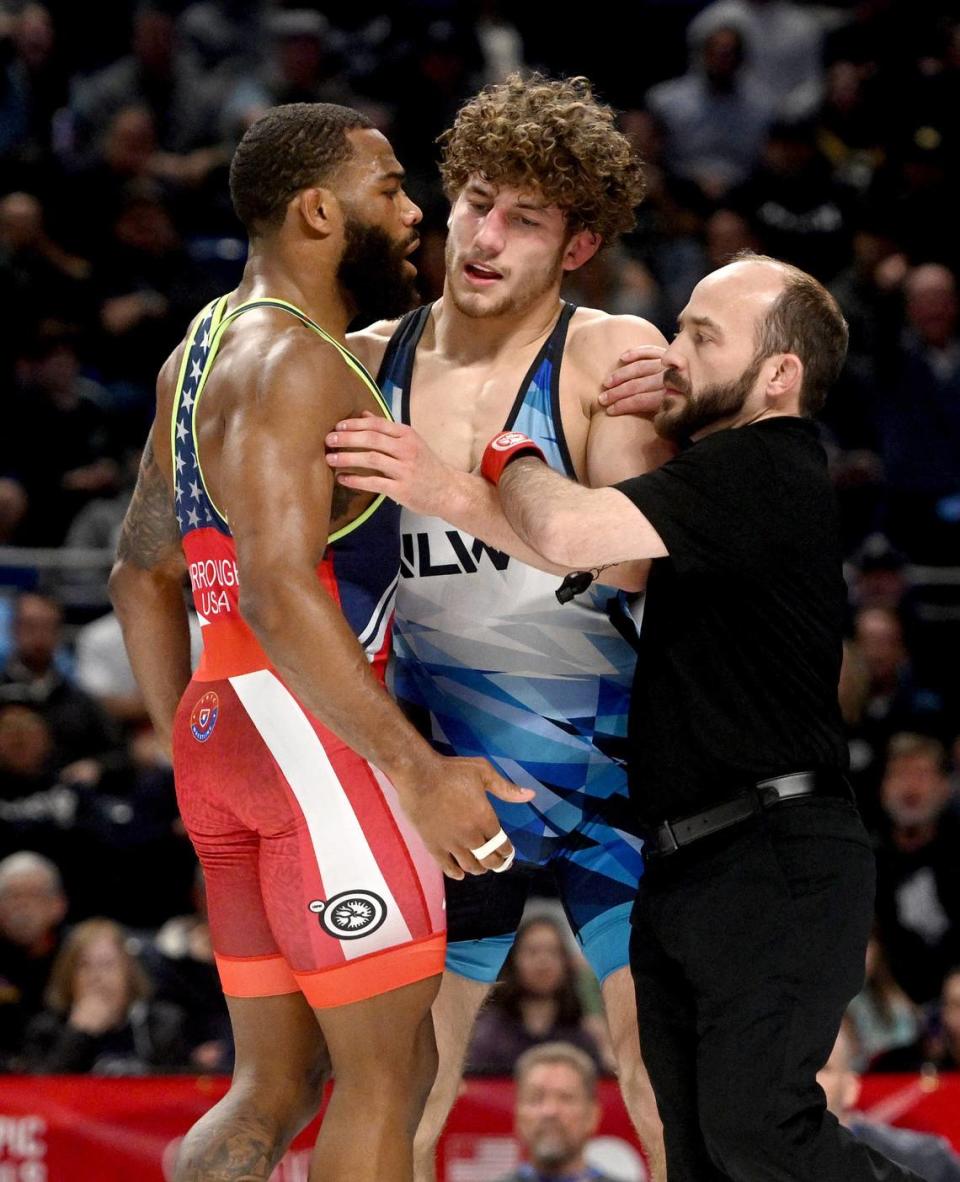 Tension flares between Jordan Burroughs and Mitchell Mesenbrink in their 74 kg semifinal bout during the U.S. Olympic Team Trials at the Bryce Jordan Center on Friday, April 19, 2024.