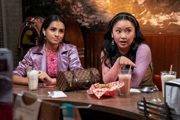 Homecoming queen Riley (Aparna Brielle) and Erika, with her LV bag, twinning.<p>Photo: Erik Voake/Courtesy of Netflix</p>