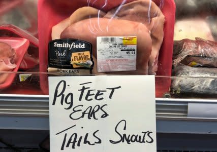 A package containing pig's ears sit on display at LeonÕs Thriftway grocery store, which also sells pigsÕ feet and snouts, in Kansas City, Missouri, U.S., July 15, 2018.  Picture taken July 15, 2018.  REUTERS/Theo Waters