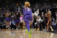 LSU's Jasmine Carson reacts to a three pointer during the first half of the NCAA Women's Final Four championship basketball game against Iowa Sunday, April 2, 2023, in Dallas. (AP Photo/Tony Gutierrez)