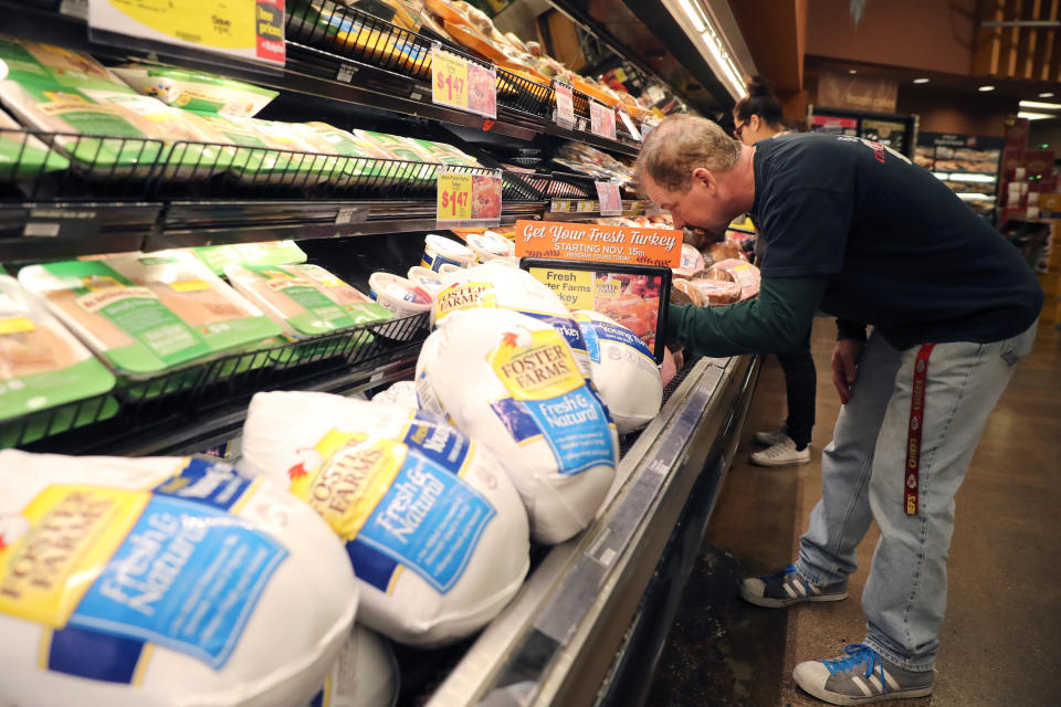 A customer shops for Thanksgiving ham at a grocery store in Los Angeles, California U.S. November 21, 2017. REUTERS/Lucy Nicholson