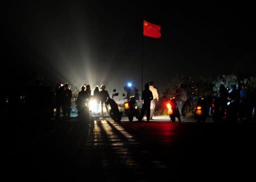 Villagers in Wukan, southern China, protest over illegal land grabs and the death in custody of a local leader in December 2011. The US ambassador to Beijing has said Chinese leaders are very fearful of social and political unrest within China