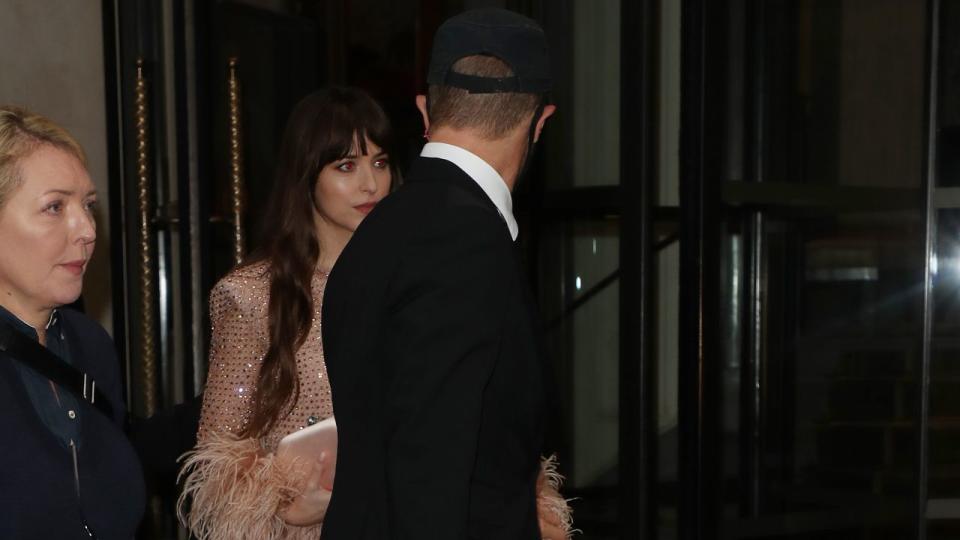 Chris Martin and Dakota Johnson. Photo by Neil Mockford/GC Images.