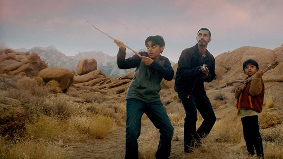 Riz Ahmed and two children in a still from Encounter.
