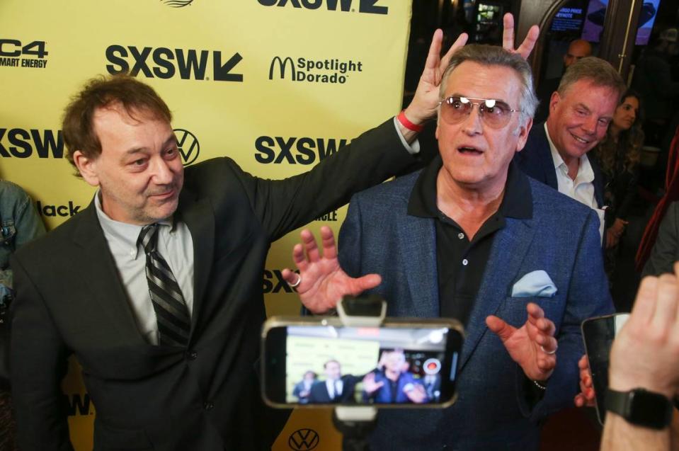 “Evil Dead” director Sam Raimi, left, will be at comic con in Lexington this weekend but star Bruce Campbell will not.