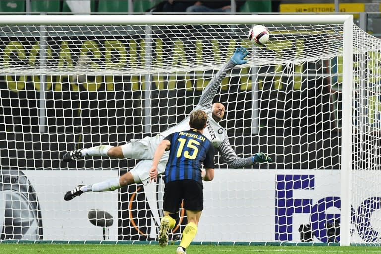 Inter Milan's goalkeeper Samir Handanovic blocks a shot on goal on October 20, 2016