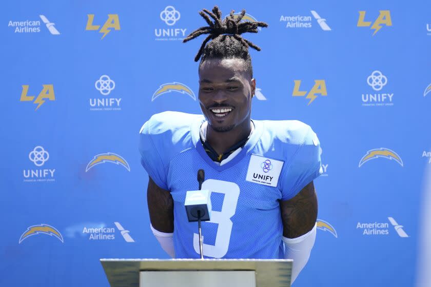Los Angeles Chargers safety Derwin James Jr. (3) speaks to reporters after a combined NFL practice with the Dallas Cowboys at the Los Angeles Rams' practice facility in Costa Mesa, Calif. Wednesday, Aug. 17, 2022. (AP Photo/Ashley Landis)