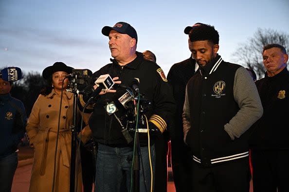 Baltimore Fire Department Chief James Wallace, with Police Commissioner Richard Worley (R) and Mayor Brandon Scott (2nd R), speaks at a press conference on the collapse of the Francis Scott Key Bridge Baltimore, Maryland, on March 26, 2024. The bridge collapsed early March 26  after being struck by a container ship, sending multiple vehicles and up to 20 people plunging into the harbor below. 