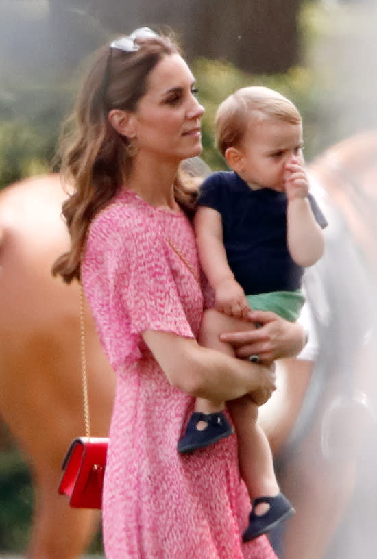 Duchess Kate pictured with Prince Louis in July 2019 at the King Power Royal Charity Polo Match. [Photo: Getty]