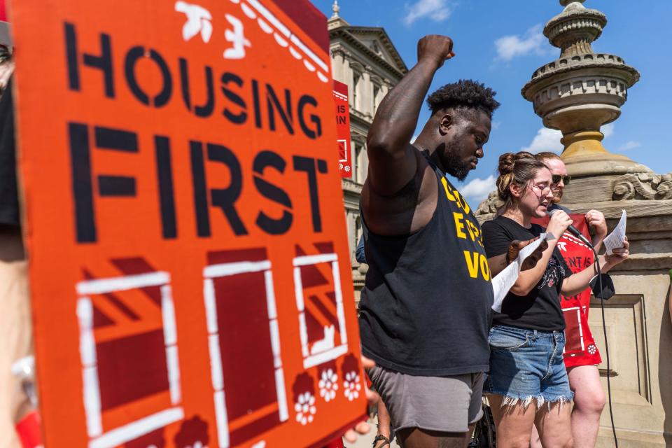 We the People Michigan housing organizer Sara Huerta Long speaks to a crowd during a rally held by Rent Is Too Damn High coalition on the steps of the Michigan State Capitol building in Lansing on Tuesday, September 5, 2023, over renters rights and investment in affordable housing.