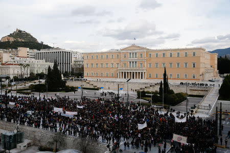 Greek school teachers take part in a demonstration in front of the parliament building against government plans to change hiring procedures in the public sector in Athens, Greece, January 14, 2019. REUTERS/Costas Baltas