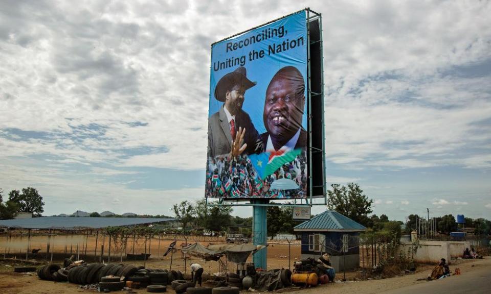 South Sudan’s president, Salva Kiir, left, is depicted alongside the opposition leader, Riek Machar, on a billboard in Juba