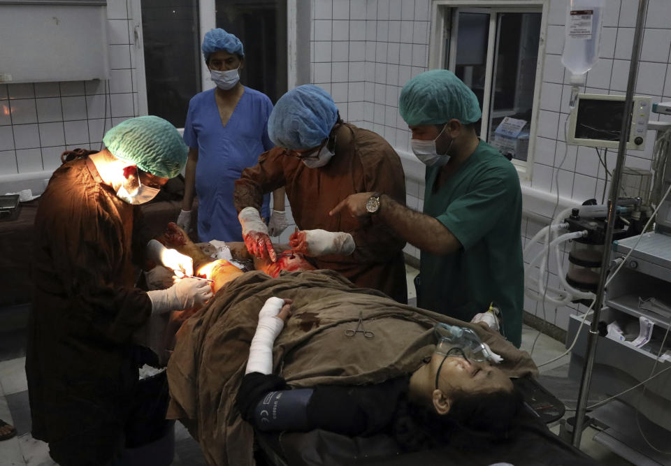 An Afghan school student is treated at a hospital after a bomb explosion near a school west of Kabul, Afghanistan, Saturday, May 8, 2021. A bomb exploded near a school in west Kabul on Saturday, killing several people, many them young students, an Afghan government spokesmen said. (AP Photo/Rahmat Gul)