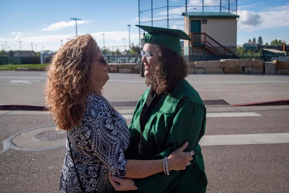 Kim Artis talks with her daughter, Rielle Artis, before Rielle's commencement ceremony at Moby Arena in Fort Collins on May 21.