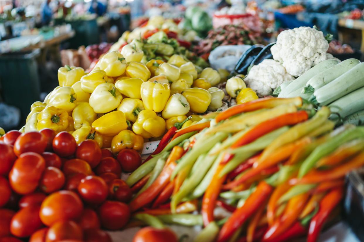 Different varieties of fresh vegetables at a farmer's market, organic food and healthy lifestyle concept