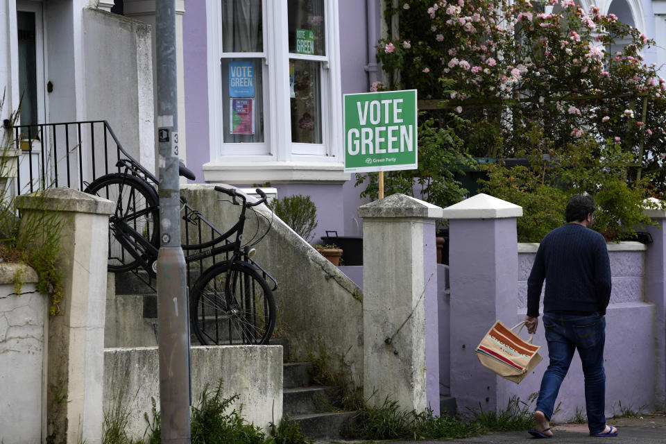 A Vote Green placard is displayed in the front garden of a house in the Round Hill Ward in Brighton, East Sussex, England, Wednesday, June 12, 2024. There’s lots of talk of change in Britain’s election campaign, but little talk about climate change. The U.K.’s July 4 vote to choose a new government comes after one of the wettest and warmest winters on record, part of trends scientists attribute to global warming. (AP Photo/Kirsty Wigglesworth)