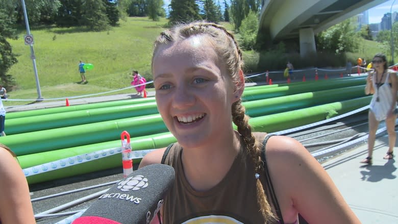 Calgary Slide the City 'a lot smoother this year,' as hundreds join in