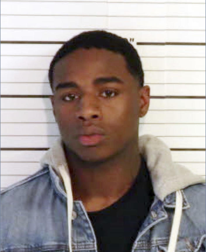 This image released by the U.S. Marshals Service shows Justin Johnson. An arrest warrant has been issued for Johnson, 23, in connection with the the Nov. 17, 2021, fatal shooting of rapper Young Dolph, who was gunned down in a daylight ambush at a popular cookie shop in his hometown of Memphis, authorities said Wednesday, Jan. 5, 2022. (U.S. Marshals Service via AP)