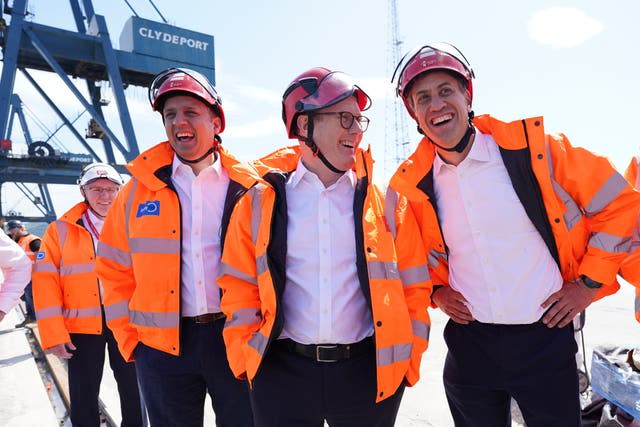 (Left to right) Scottish Labour leader Anas Sarwar, Labour Party leader Sir Keir Starmer and shadow secretary of state for energy security and net zero Ed Miliband at the Port of Greenock 