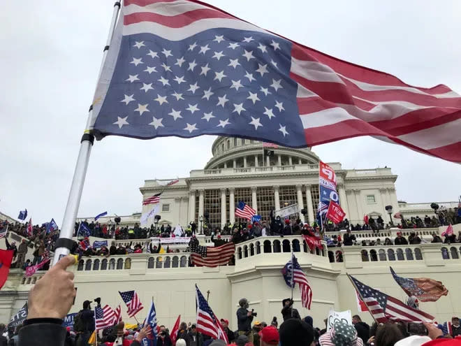 Rioters gather at the U.S. Capitol to protest certification of the election of Joe Biden on Jan. 6, 2021.