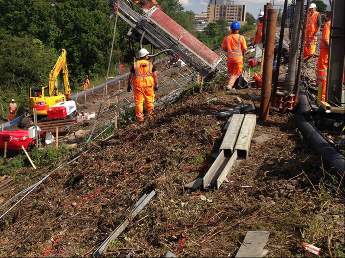 Slip sliding away: Network Rail engineers work to prevent landslips (file photo) (Network Rail)