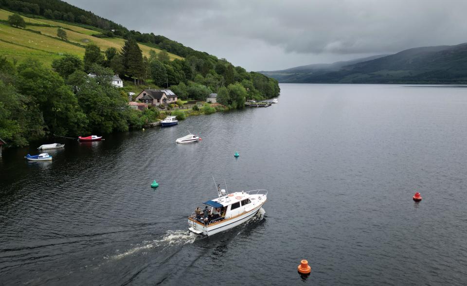 Nessie hunters board a boat on Loch Ness during the biggest search for the Loch Ness monster in 50 years over the weekend of Aug. 27, 2023.