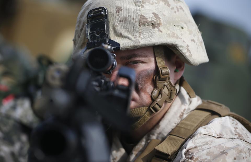 U.S. marines participate in a U.S.-South Korea joint landing operation drill in Pohang March 31, 2014. The drill is part of the two countries' annual military training called Foal Eagle, which began on February 24 and runs until April 18. (REUTERS/Kim Hong-Ji)