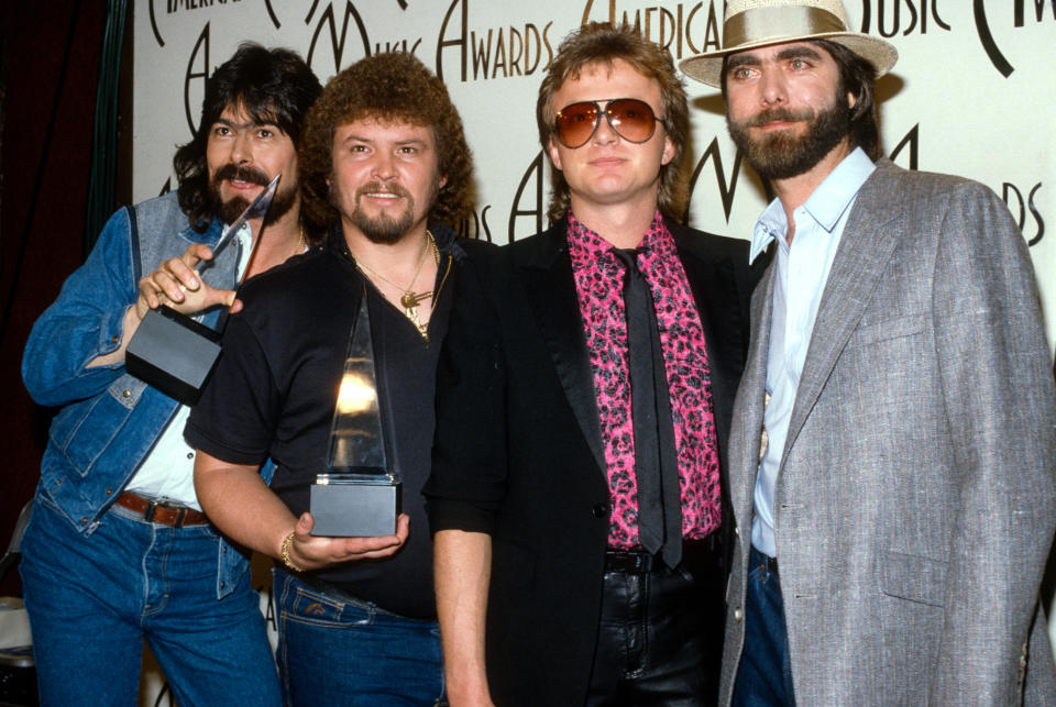From left: Alabama’s Randy Owen, Jeff Cook, Mark Herndon and Teddy Gentry at the American Music Awards circa 1985 (Getty Images)