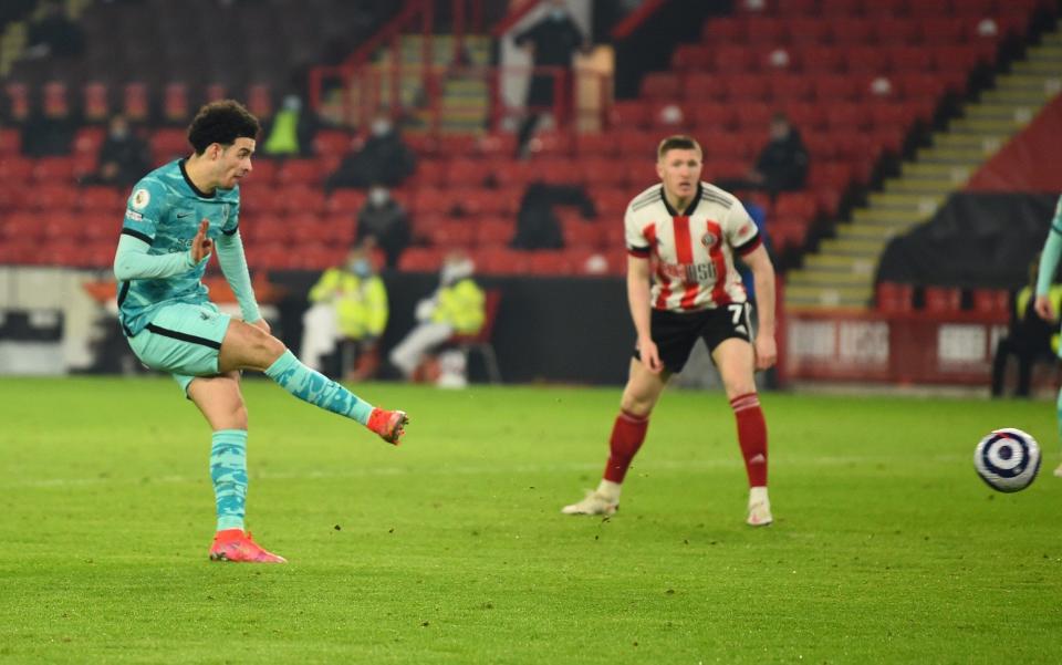 Curtis Jones of Liverpool scores the first goal during the Premier League match between Sheffield United and Liverpool at Bramall Lane - Getty Images