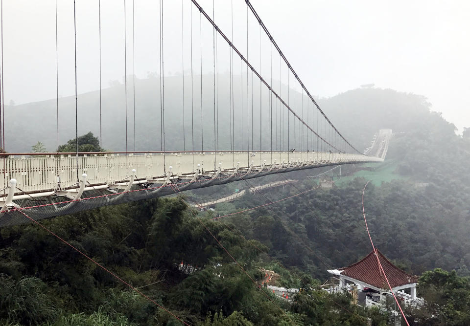 全國最長景觀吊橋嘉義縣梅山太平雲梯，23日上午於雲梯入口廣場辦理啟用典禮，下午1時30分開放遊客登梯參觀。(中央社)