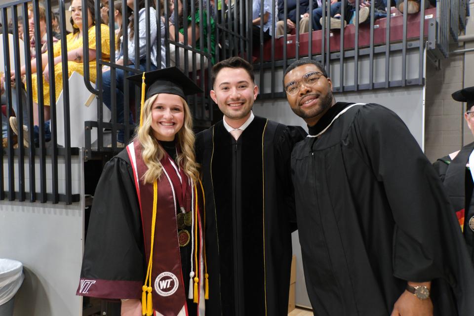 Elizabeth Valicek (left) student regeant, Fileberto Avila, student president and Joseph Peterson alumni speaker Saturday at the WT Commencement Ceremony in Canyon.