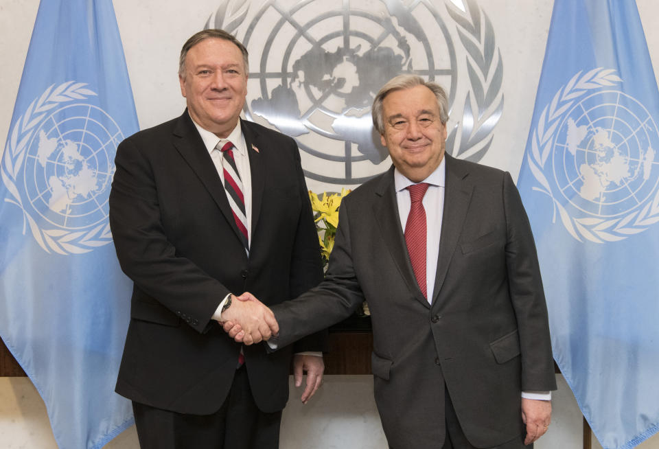 In this photo provided by the United Nations, U.N. Secretary General Antonio Guterres, right, greets United States Secretary of State Mike Pompeo, Friday, March 6, 2020 at United Nations headquarters. (Mark Garten/The United Nations via AP)